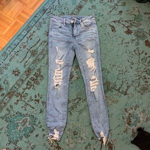 Ripped skinny jeans, high waisted